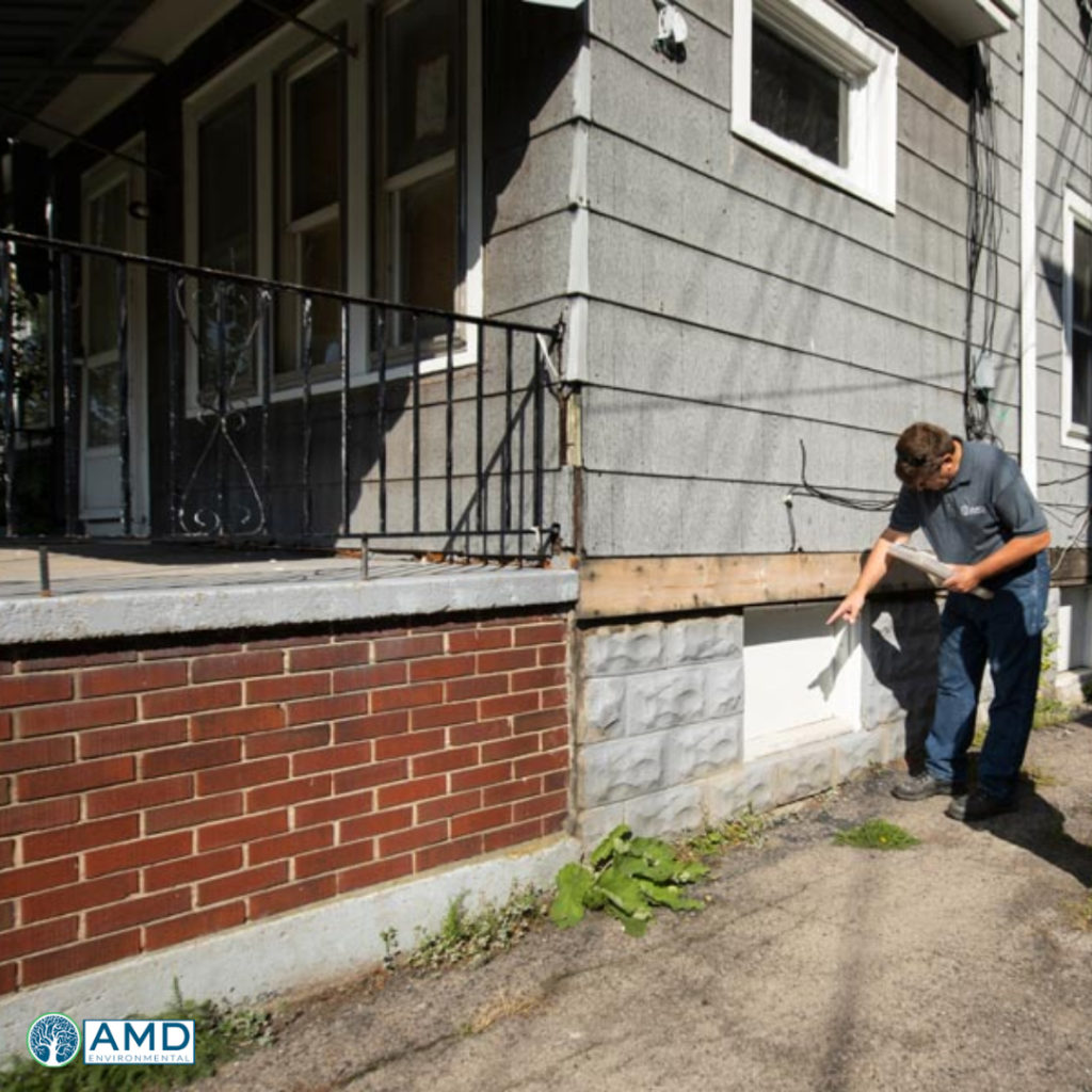 Technician performing asbestos inspection